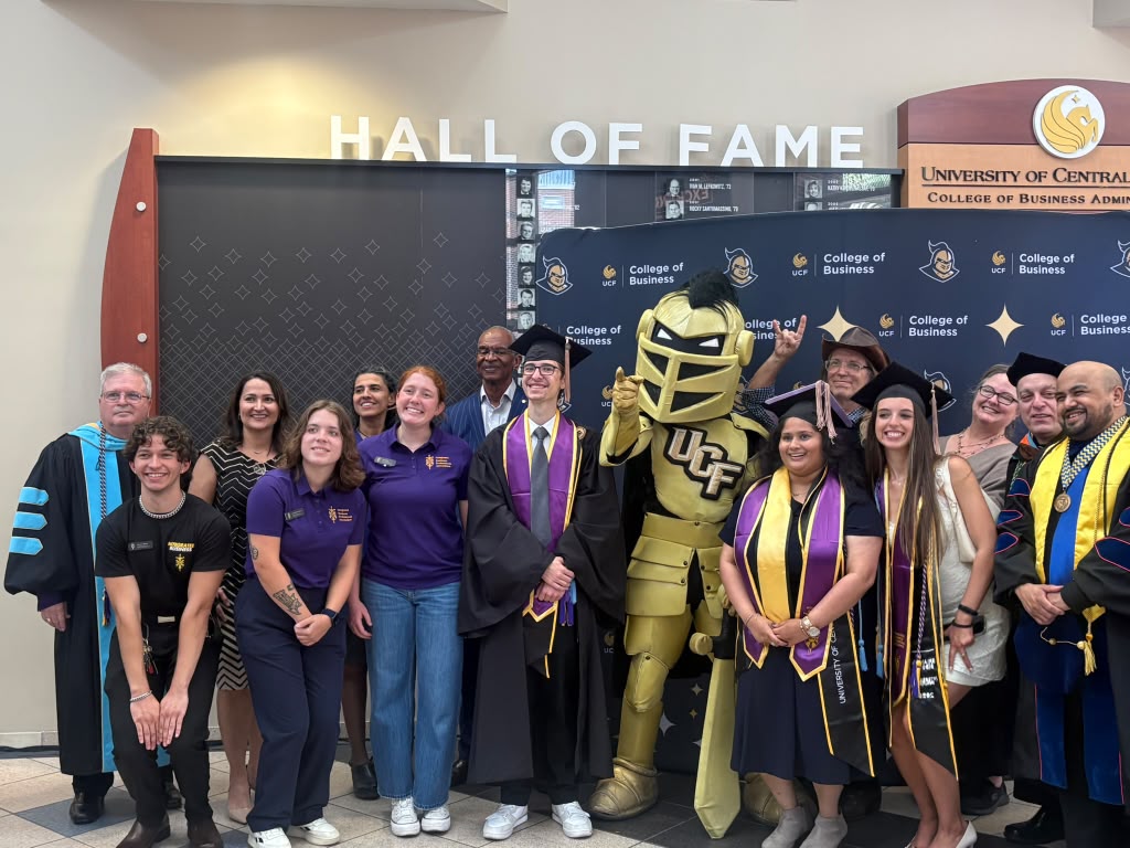 IB Program Ambassador Graduates with faculty.